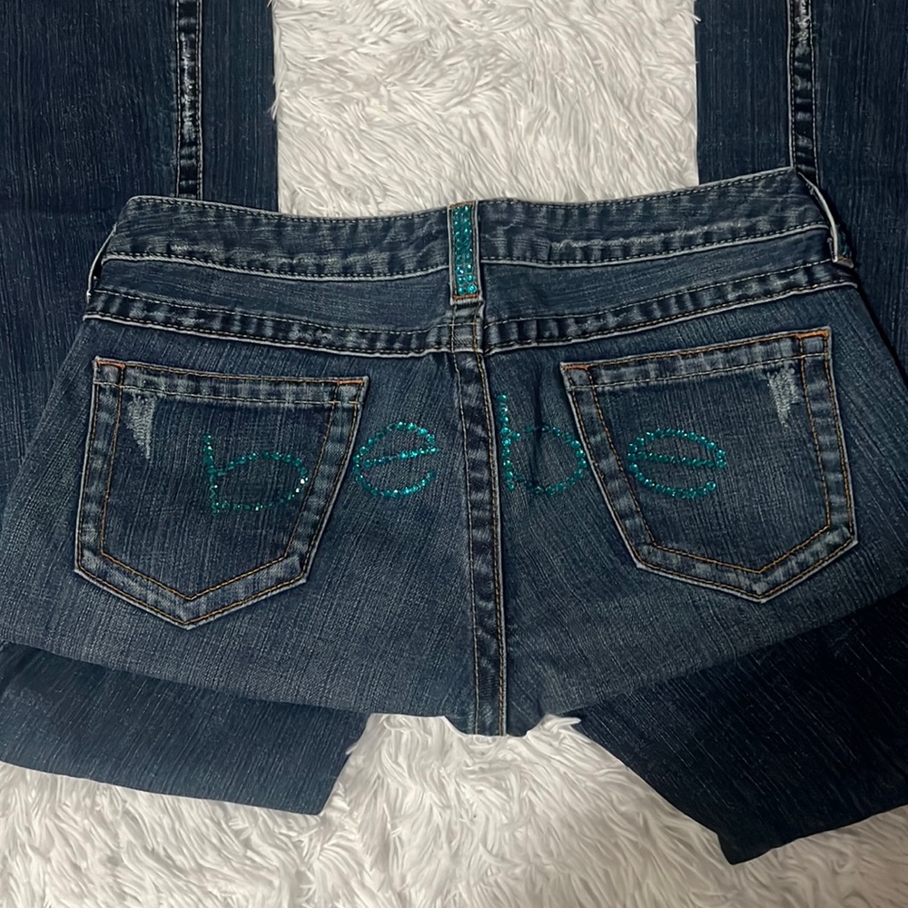 Bebe jeans with turquoise rhinestones on the butt